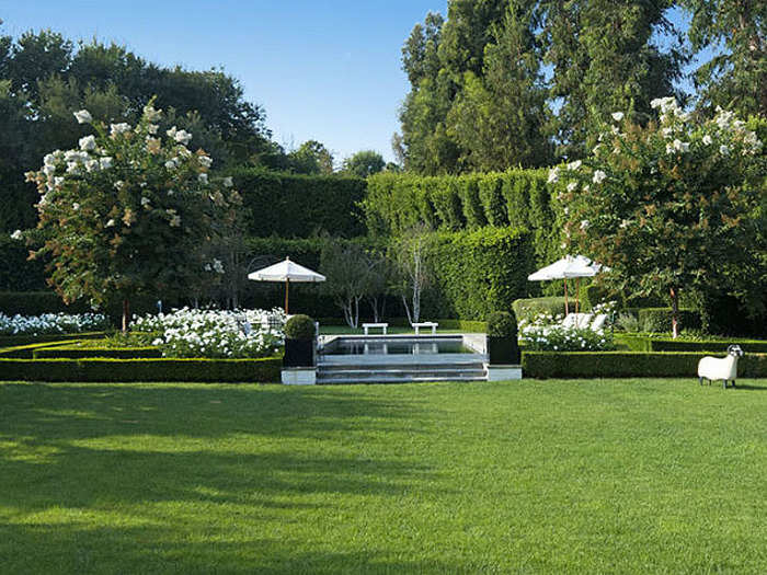 The hedges around the home range from 20 to 50 feet tall.