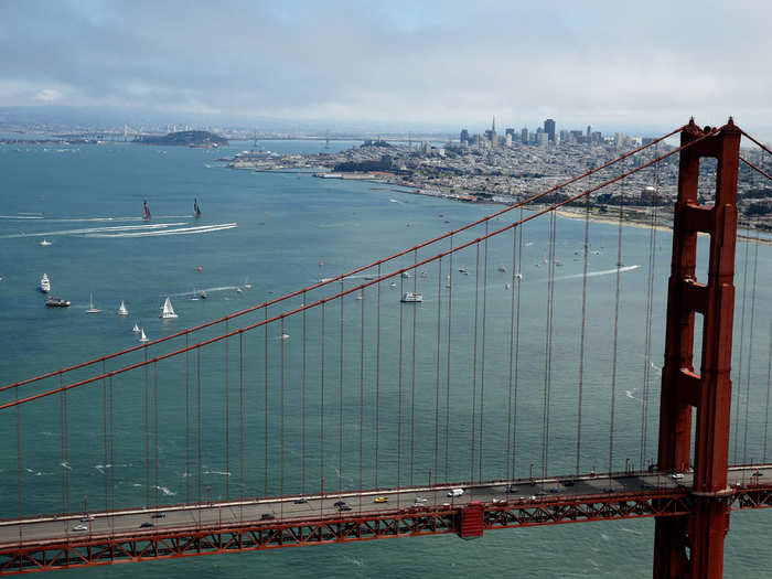 The teams race away from the Golden State Bridge during Race 6.