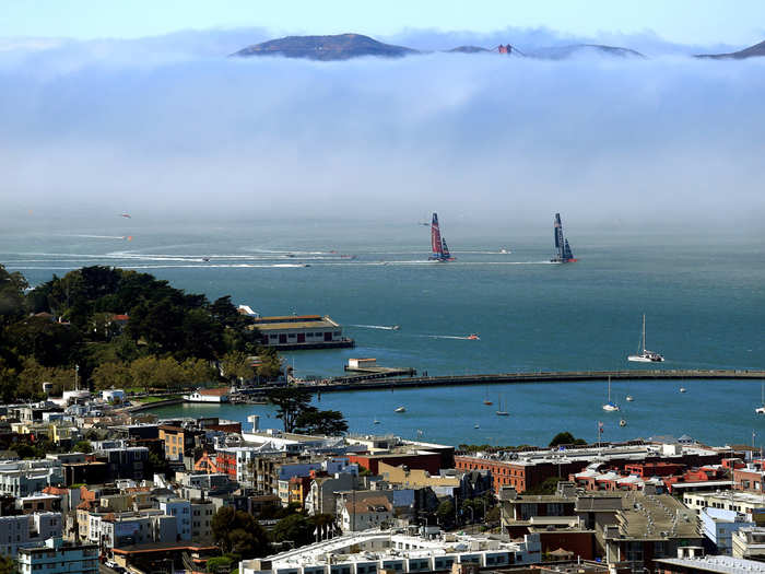 The teams race away from the Golden Gate Bridge in Race 3.