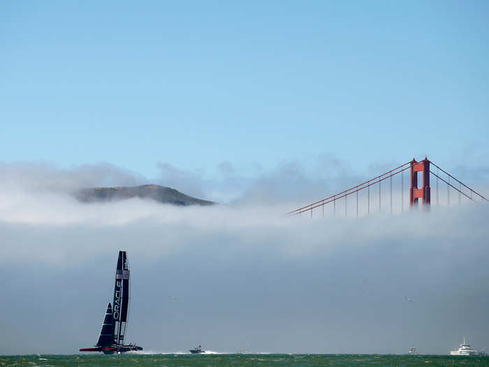 Oracle Team USA warms up as the morning fog begins to break up.