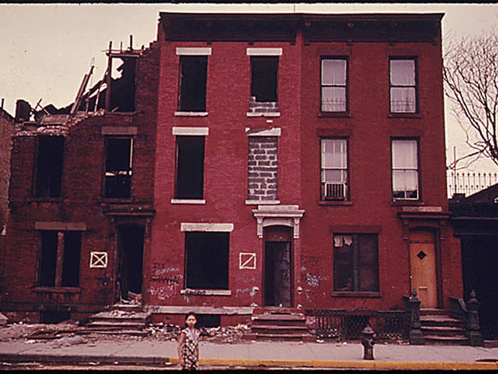 Although partially gutted by fire, one portion of this building across from Lynch Park, in Brooklyn, is still inhabited.