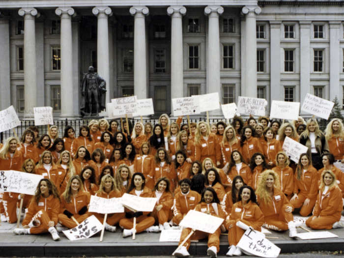 Hooters girls protest for equal opportunity pay in Washington.