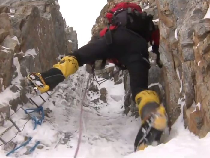 At the meeting it was decided that Sherpas and Pakistani porters would set off from camp before midnight, July 31, to start preparing fixed rope going up the mountain.