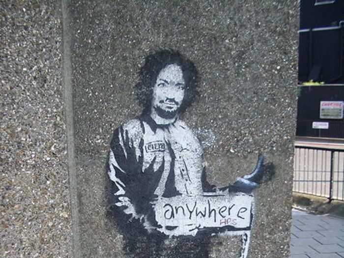 Banksy painted Charles Manson as a hitchhiker on a London street corner in 2005.