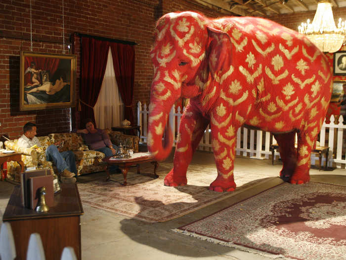 A painted live elephant was part of Banksy