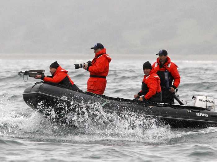 No beast is safe from an armed Vladimir Putin. He shot an endangered grey whale with a crossbow from a motorboat, again to help researchers track the animal.