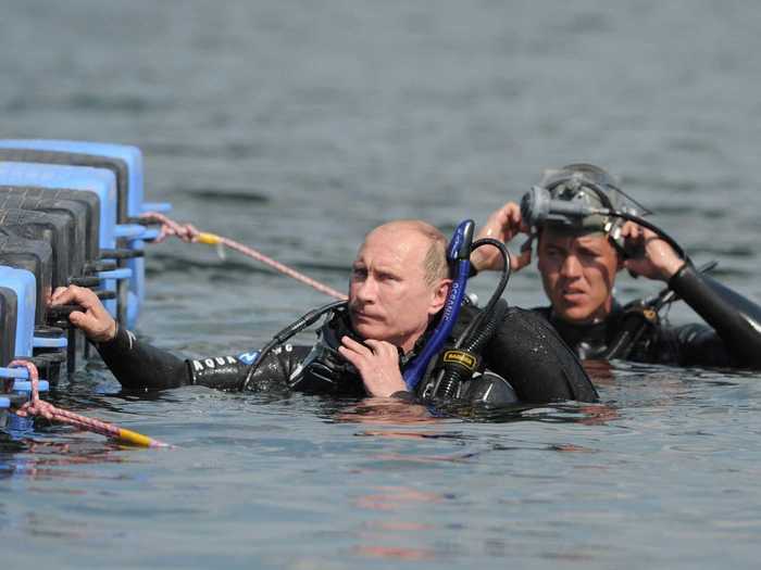 Putin is also a man of science. Here he SCUBA dives at an archaeological site.