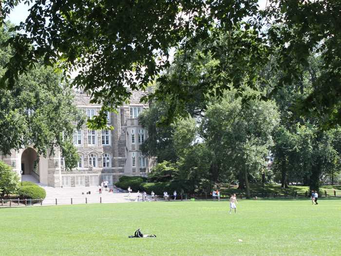 In front of Keating Hall, students lounged outside in the sun.