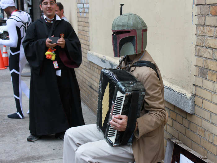 Boba Fett was also found playing the accordion a few blocks from the Javits Center. And yes, he can play the "Star Wars" theme song.