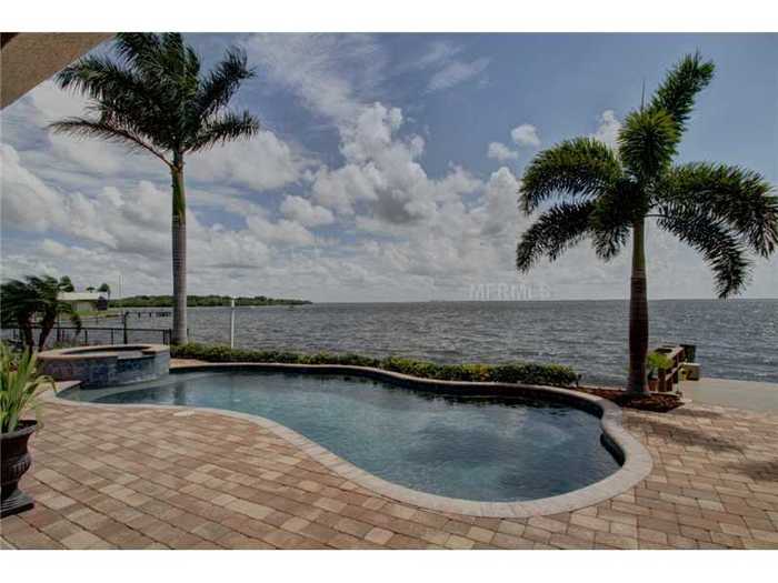 But the star of the house is actually outside with the deck, the pool, and the view.