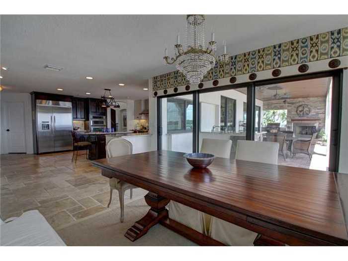 Here is a look from the dining area back towards the kitchen and the deck.