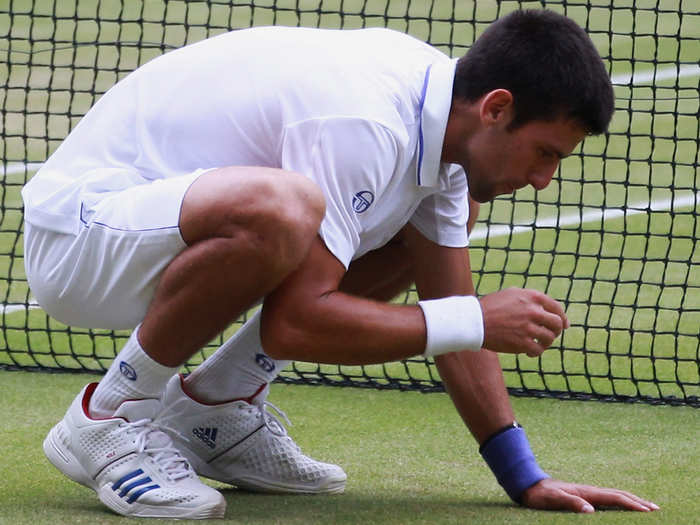 In his excitement, tennis star Novak Djokovic has eaten grass after winning.