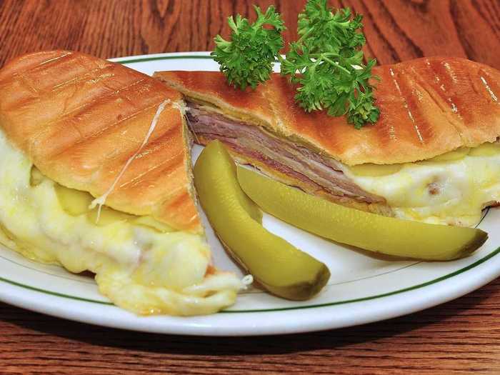 FLORIDA: The sunshine state is known for its Cuban sandwich with generous portions of ham, roasted pork, Swiss cheese, pickles, and mustard, all on two slices of Cuban bread.