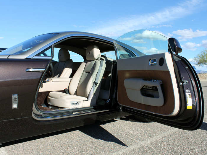 In keeping with its style, Rolls-Royce put coach (aka suicide) doors on the Wraith. The wood on the door is one piece and comes as an option.