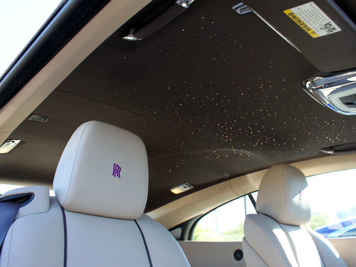 Options like the Starlight Headliner, which mimics a night sky with fiber optic lights, and the "RR" monograms on the headrests pushed our car