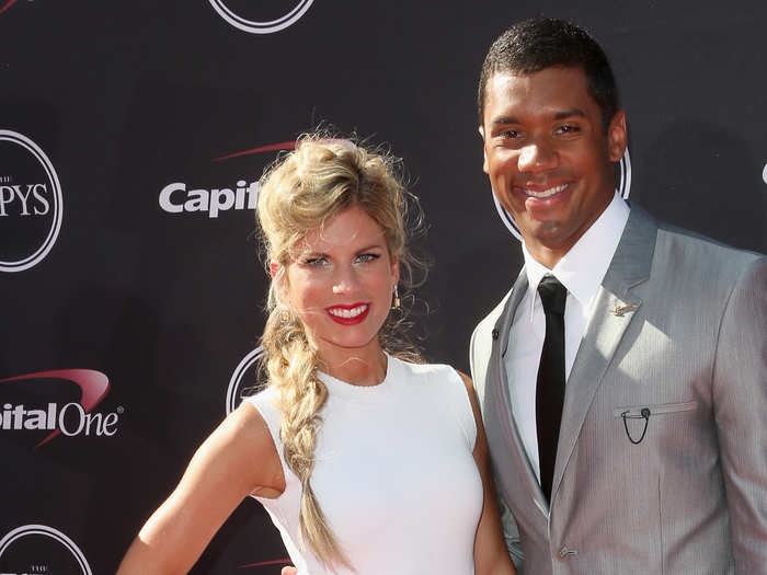 Russell Wilson (#22) is married to college sweetheart Ashton Wilson.