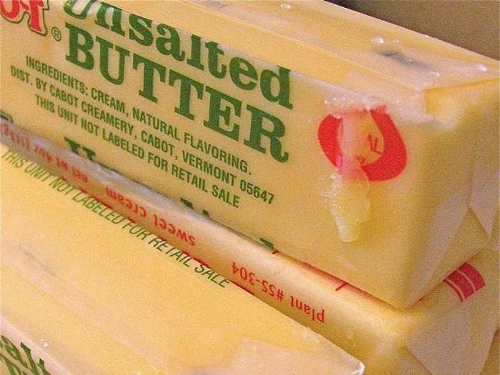 Used butter wrappers are better than pricey sprays.