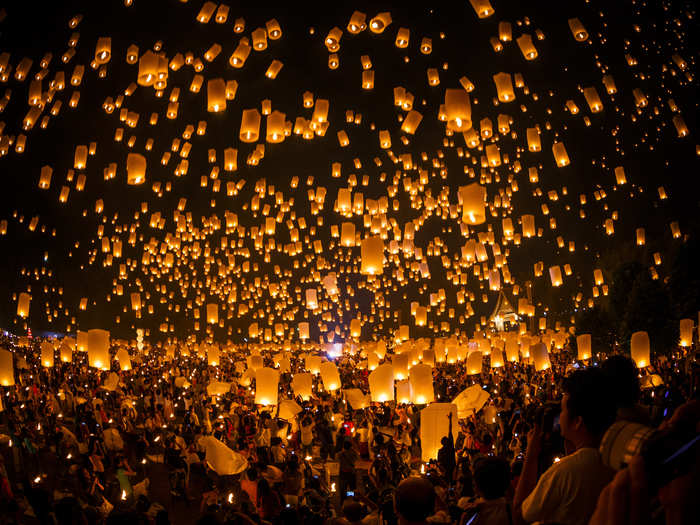 Thousands of lanterns float to the night sky at the Thai festival Loi Krathong, which takes place during a full moon in November.