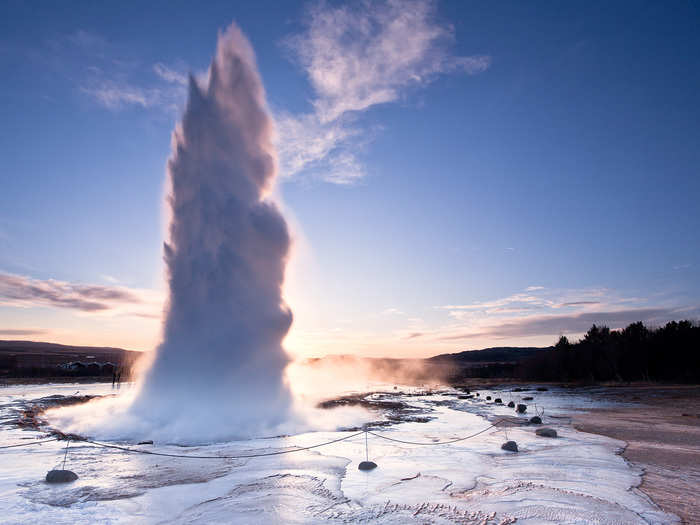 The Strokkur geyser in Iceland erupts every four to eight minutes, blasting water up to 130 feet into the air. Hot magma under the Earth heats water until it spews out of a hole in the ground.