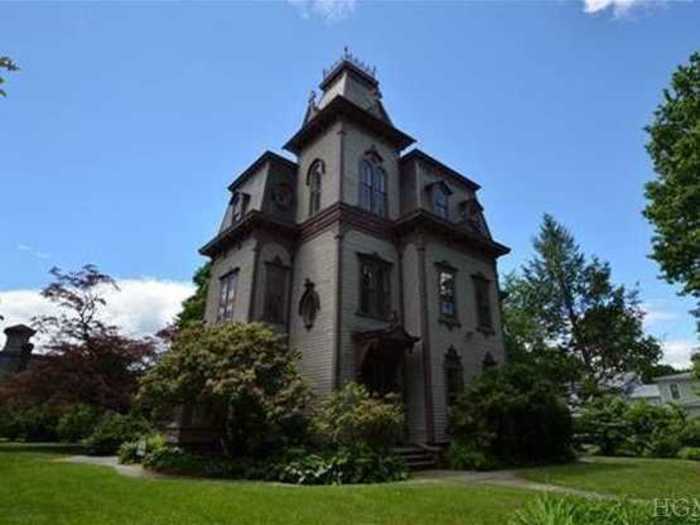 This huge Victorian has 9 bedrooms and plenty of original architectural details.