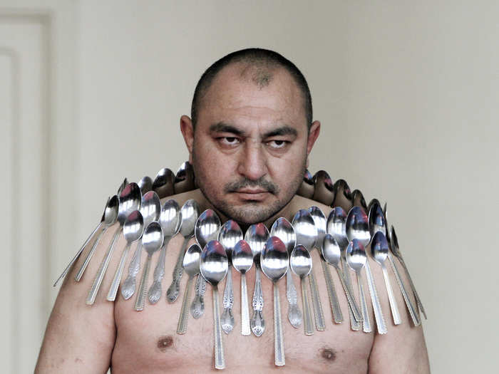 The Guinness World Record for "Most spoons on a human body" belongs to Etibar Elchiyev. Here he is in Tbilisi, Georgia in December 2011 when he won the title with 50 metal spoons magnetized to his body.