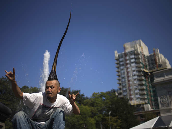 Japanese fashion designer Kazuhiro Watanabe currently holds the Guinness World Record for "tallest mohawk" at 3 feet and 8.6 inches tall. He entered the Guinness World Records in September 2012 for his 