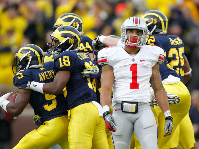 In 2011, Ohio State wore their traditional road uniform but Michigan wore helmet with numbers.