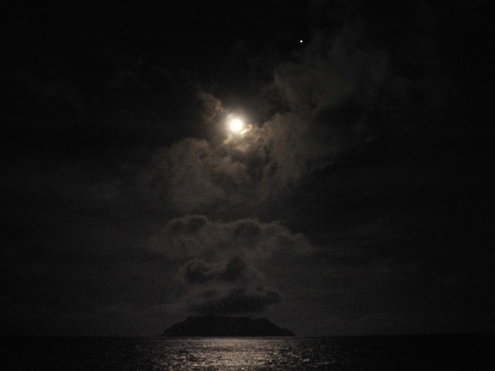 Around away, Probst took this picture of Pitcairn outlined in the moonlight and Venus.