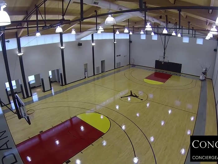 The full-court basketball court is the centerpiece of the house.