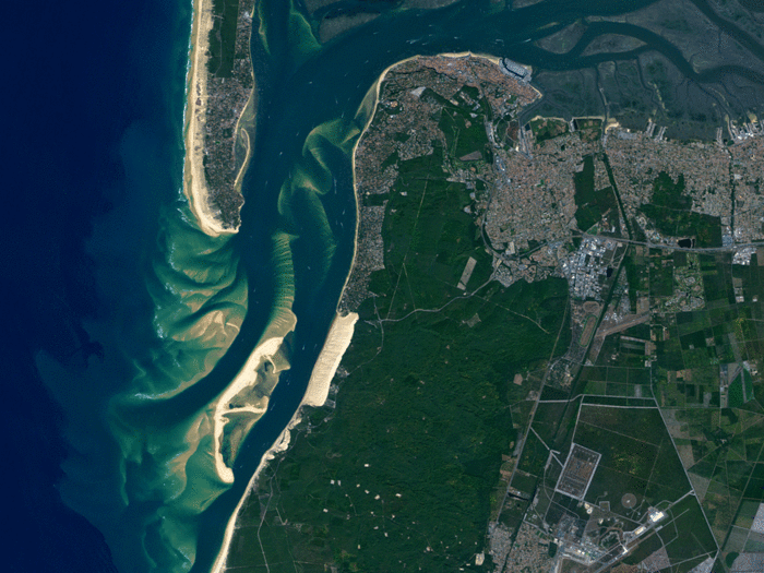 The Dune of Pyla in France (it looks like a light-brown rectangle near the center of this image) is the tallest sand dune in Europe. The large green area surrounding it is Landes Forest, Europe