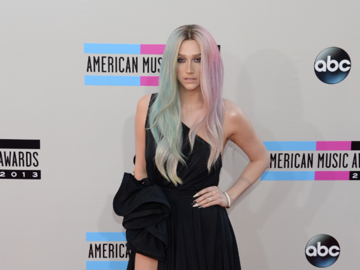 Ke$ha went with a thigh-high slit and rainbow ombré hair on the red carpet.