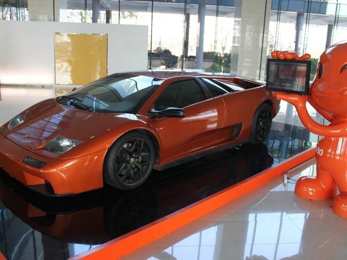 When we finally entered a building, we found this Lambourgini replica, built entirely from parts bought on Taobao.