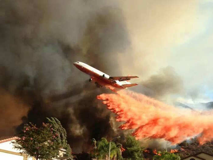 The Corona Fire Department, battling a wildfire about 90 miles away from Los Angeles that started in August, posted photos of its efforts to its Facebook page, including this incredible shot of a DC-10 air tanker flying over a residential area.