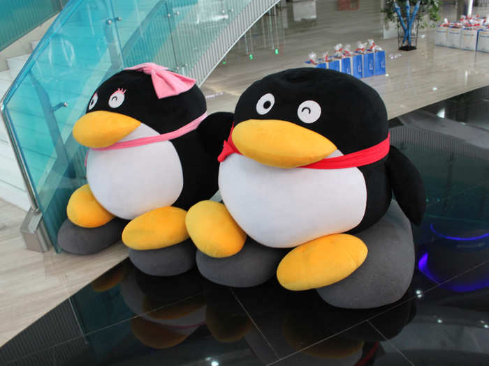 Back in the atrium, I ran into these two, mascots for QQ.com. They are QQ girl (L) and QQ boy (R)