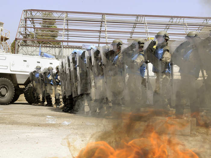 The United Nations Disengagement Observer Force (UNDOF) in Golan Heights has maintained the ceasefire between Syria and Israel since the end of the Yom Kippur war in 1974. Before the Syrian Civil War, there were no major incidents in the area. Here, troops conduct a crowd and riot control exercise at Camp Faouar, Syria.