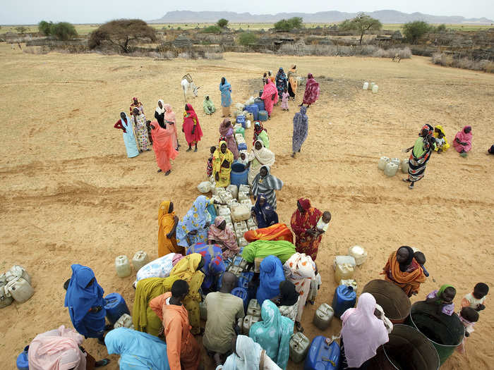 The African Union – United Nations Hybrid Operation in Darfur (UNAMID) began in 2007. ?Its goal is to bring stability to the war-torn region of Darfur in Sudan. Here, UNAMID troops distribute water to a village in Northern Darfur.