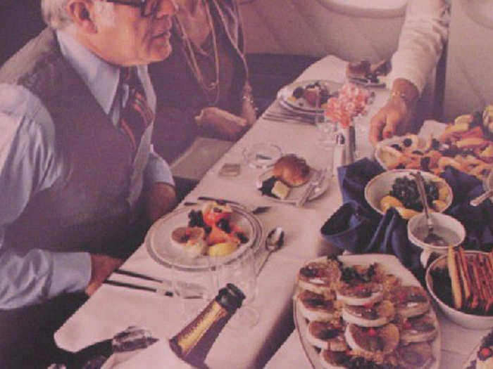 In the late 1970s, people could still sit around tables and eat aboard planes.