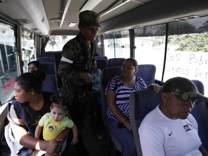 They even board public buses at checkpoints throughout the city to look for weapons and drugs.