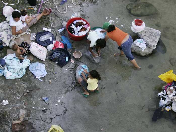 Almost 1.5 million people have no access to potable water in Honduras, according to a United Nations Development Programme report. Many families wash their clothes and drink from the same sources.