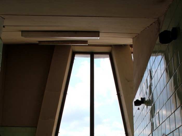 The view from a tiled room positioned directly beneath the building