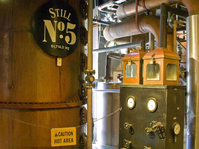 The room was deafening and super hot. This is where the alcohol steam from the sour mash is captured and turned into liquid form. The product is moonshine at this point. I wanted to get out of there because I was worried the ancient still would erupt.