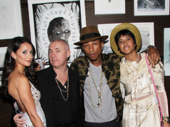 Roxie Nafousi, Damien Hirst, Pharrell Williams and wife Helen Lasichanh at the Tracey Emin dinner hosted by Phillips and Vanity Fair at Cecconi