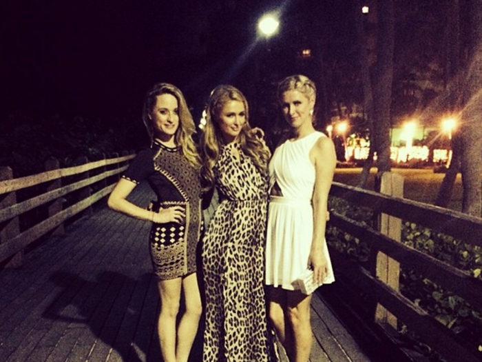 Paris Hilton posed with her cousins outside.