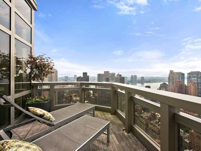 The penthouse features a private terrace. The apartment has 200 square feet of outdoor living space.