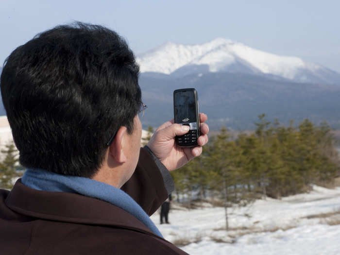 Many North Koreans now have mobile phones. Orascom says their service covers 75% of North Korea