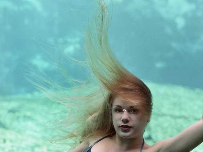 To become a Weeki Wachee mermaid, the performers must be able to swim without air down a tunnel with their heavy tails on, according to photographer Annie Collinge.