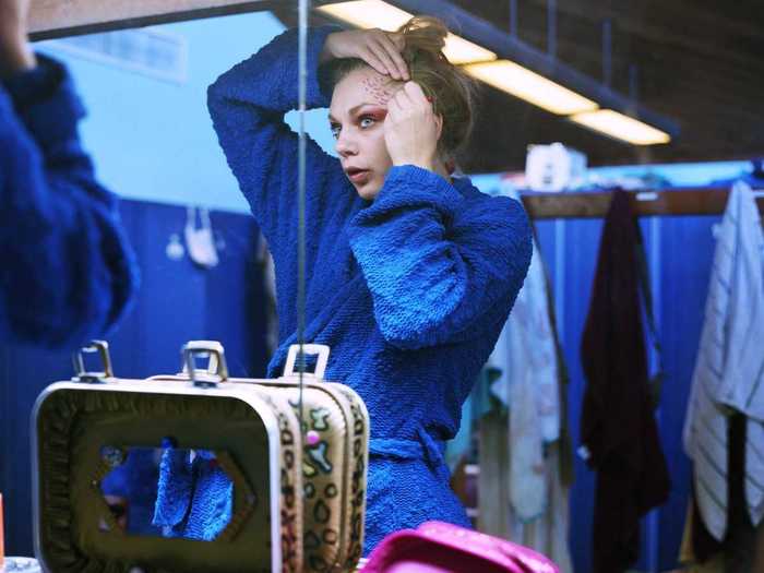 She was also able to photograph them in their locker rooms and outside the spring, watching them get ready for the live shows.