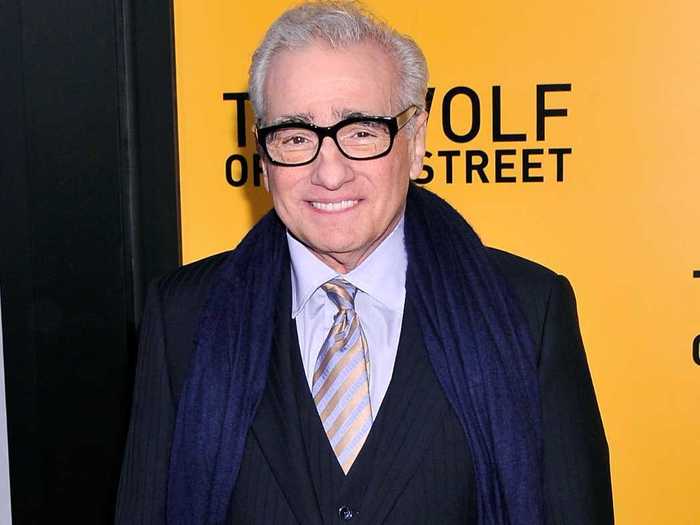 Director Martin Scorsese smiles for the photographers.