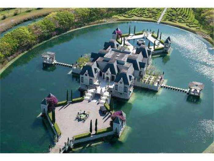 This Miami mansion has a moat.