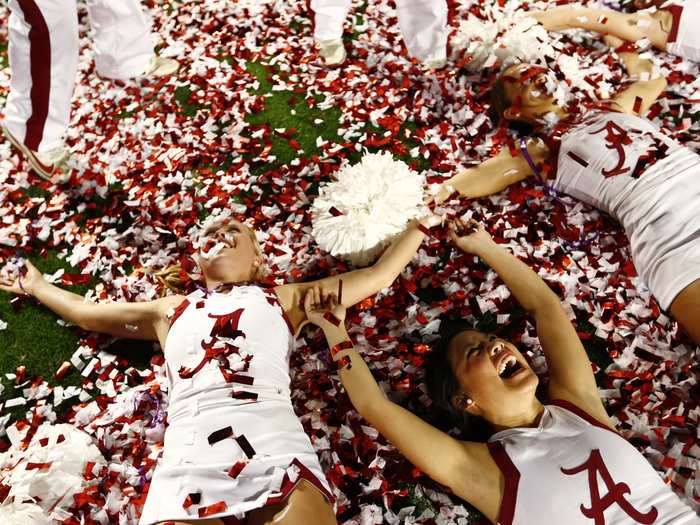 Alabama cheerleaders celebrate after the football team won its second consecutive National Championship.